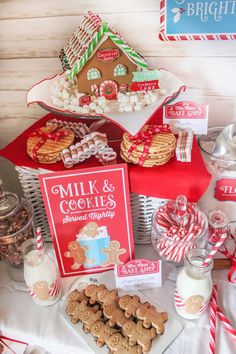 a table topped with lots of different types of cookies and other foods on top of it