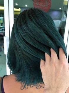 If you're thinking about trying the black and green hair trend, here are over 23+ fabulous looks to give you an inspiration for your hair color options. Hair color ideas | Hair style ideas | green hair Emerald Balayage Hair, Dark Teal Balayage, Colored Short Hair Ideas, Emerald Green Balayage Hair, Emerald Balayage, Dark Green And Purple Hair, Smokey Teal Hair, Dark Green Ombre Hair, Emerald Green Hair Balayage