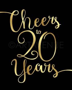 the words cheers to 20 years written in gold on a black background with a handwritten inscription