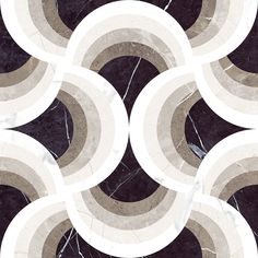 a black and white marble pattern with circles