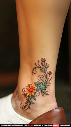 a close up of a person's foot with flowers on it and the bottom part of their leg