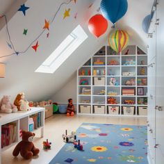 a child's playroom with toys and bookshelves