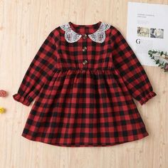 Girls Plaid Hollow Out Doll Collar Long Sleeve Dress Wholesale - PrettyKid Fall Lace Trim Dress With Doll Collar, Cute Dress With Doll Collar For Dress-up, Long Sleeve Cotton School Dress, Long Sleeve Ruffled Dress For School, Cute Winter Dress With Doll Collar, Cute Doll Collar Winter Dress, Cute Plaid Dresses For School, Long Sleeve Winter School Dress, Cute Winter Dress For School