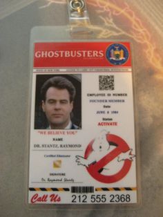 an id badge with a ghostbuster sticker on it