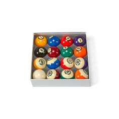 pool balls in a box on a white background