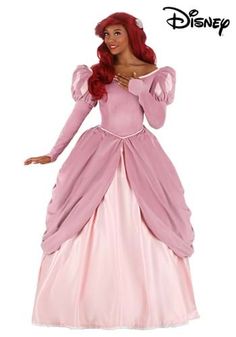 a woman in a pink princess costume