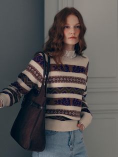 This knit pullover features a luxurious blend of cashmere wool in a jacquard knit pattern. It features the striking jacquard pattern adds a unique touch to the design.- Semi-cropped length that makes your look stylish- Loose fit for a comfortable feel- Versatile design for wearing alone or layering over other pieces Fair Isle Patterned Sweater For Fall, Fall Fair Isle Patterned Sweater, Fall Fair Isle Pattern Sweater, Brown Nordic Jacquard Knit Sweater, Nordic Brown Jacquard Knit Sweater, Winter Jacquard Knit Beige Sweater, Beige Fair Isle Sweater For Fall, Elegant Wool Jacquard Knit Sweater, Wool Jacquard Knit Sweater For Fall