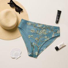 This classic high-waisted bikini bottom featuring Van Gogh's Almond Blossoms will be the talk of the pool party! Be a trendsetter with this unique piece of swimwear.  This listing includes the bottoms only - don't forget the top! 💕Michigan-based business💕 Get this Recycled high-waisted bikini bottom and match it with your favorite swimsuit top. It's comfortable, high-waisted, and double-layered--perfect for an adventurous beach day or a chill spa visit! * Fabric composition may vary based on f Almond Blossoms, Van Gogh Almond Blossom, Almond Blossom, Care Label, Swimsuit Tops, Pool Party, Beach Day, Women Swimsuits, Van Gogh