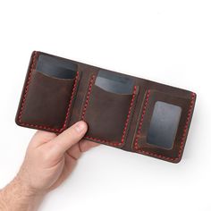 This Leather Trifold wallet makes a THUD when it lands on the table.The Heritage Brown Trifold is unlike any wallet you've ever seen. Perfect for long trips where you need access to deep pockets and a flip-out ID window. This wallet will look better the more you use it and is built for adventure. As Patina forms on the leather, your wallet will become a record of your time together.This full-grain leather wallet is designed to hold a lot of cards and a lot of cash. Easily flip out your ID when i Trifold Wallet With Card Slots For Everyday Use, Everyday Trifold Wallet With Card Slots, Trifold Wallet With Interior Card Slots For Travel, Rfid Blocking Trifold Wallet For Everyday Use, Brown Trifold Wallet For Everyday Carry, Trifold Wallet With Rfid Blocking For Travel, Trifold Card Holder With Interior Slots For Travel, Trifold Travel Card Holder With Interior Slots, Travel Trifold Card Holder With Interior Slots