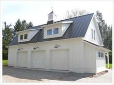 a two car garage with an attached loft