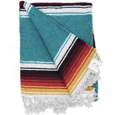 multicolored towel folded on top of each other