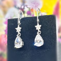 These pear dangle drop earrings are great for weddings and many occasions and arrive in a wrapped gift box. Size : 1.26" (3.3 cm) Main Stone Size : 10 mm x 7 mm (2 Carat / each) Stone: Lab Moissanite Diamond Main Stone Color : Clear White Main Stone Shape : Pear Cut Metal : Real Solid 925 Sterling Silver Hallmark : 925 Stones Setting : Prong Finish : High Polished Guaranteed High Quality Pear Dangle Drop Earrings 2 Carat 925 Sterling Silver Pear Cut Dangle Bridal Wedding Bridesmaid Earrings Gift Bridesmaid Gifts Earrings, Pear Earrings, Silver Gift Box, Earrings Bridesmaid, Bridesmaid Wedding, Clear White, Wedding Bridesmaid, Bridesmaid Earrings, 2 Carat