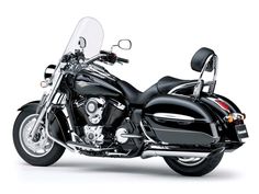 a black motorcycle is shown on a white background