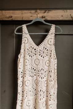 Get into "beach vacation mode" with our laid back Boho Sleeveless Casual Crochet Cover-Up Tunic Top. Perfect for lounging on the sand or strolling the boardwalk, this top will keep you comfortable and stylish all day long. True to size V-neck Cover-Up tunic top Crochet Scalloped Edging Colors: Beige Fabric: 65% Cotton / 35% Polyester Brand: Adora Have questions or need help deciding on fit? Want styling advice? Message us on our FB page here! We'd love to help you!