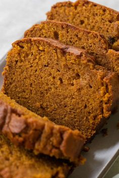 slices of pumpkin bread on a white plate