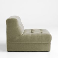 an upholstered chaise lounge chair on white background