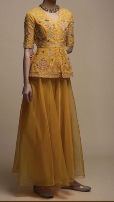 Dark Amber Yellow Palazzo Suit In Organza With Matching Peplum Top Adorned In Zari And Thread Work Cultural Wear, Embellished Crop Top, Kalki Fashion, Palazzo Suit, Casual Indian Fashion, Embroidered Crop Tops, Fancy Blouses, Fancy Blouse Designs, Stylish Dress Designs