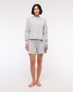 Comfy long-sleeve tee in our softAF fabric and oversized-fit silhouette, featuring an all-over grid micro-waffle texture, crew neckline and straight hem. Gray Long Sleeve Tops For Daywear, Comfy Long Sleeve Spring Tops, Comfy Long Sleeve Tops For Spring, Sporty Long Sleeve Top For Loungewear, Gray Relaxed Fit Tops For Daywear, Relaxed Fit Sweatshirt For Spring Lounging, Spring Sporty Long Sleeve Top Relaxed Fit, Spring Athleisure Long Sleeve Top With Relaxed Fit, Sporty Long Sleeve Top Relaxed Fit For Spring