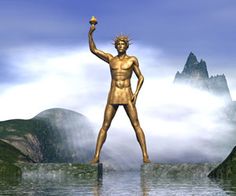 a golden statue standing on top of a mountain