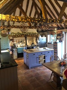 the kitchen is decorated with christmas lights and decorations