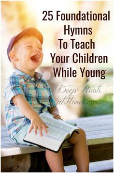 a young boy sitting on top of a wooden bench holding an open book and laughing