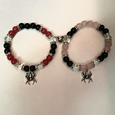 It is all handmade by me a 13 year old trying to start my own business! Handmade Adjustable Themed Bracelets, Handmade Themed Adjustable Bracelets, Pink Handmade Themed Bracelets, Handmade Themed Pink Bracelets, Handmade Themed Bracelet With Round Beads, Themed Handmade Pink Bracelets, Handmade Themed Stretch Bracelet With Round Beads, Handmade Themed Black Bracelets, Handmade Round Stretch Bracelet Gift