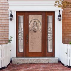 the front door is decorated with an image of a pineapple on it's side