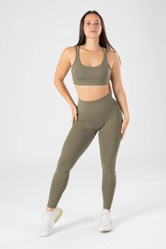 Our best-selling Original Sculptseam® Plus Legging is back and better than ever - now with an improved waistband (with more stretch). High rise minimal design with no front-seams and completely squat proof. Plus a V-shape back waistband to accentuate curves.Featuring Sculptseam® Plus: A bolder take on our invisible booty-shaping technology for extra glute separation.Ultra-stretchy and breathable, with a silky-smooth finish. RecStretch™ fabric moves with you and keeps you cool throughout your wor Solid Activewear With Wide Waistband For Training, Functional Activewear With Wide Waistband, Functional Solid Activewear With Wide Waistband, Solid Color Activewear With Wide Waistband For Sports, Green Compression Activewear With Contoured Waistband, Green Fitted Activewear With Contoured Waistband, Solid 4-way Stretch Squat Proof Activewear, Squat Proof Solid Activewear With 4-way Stretch, Green Squat-proof Fitted Activewear