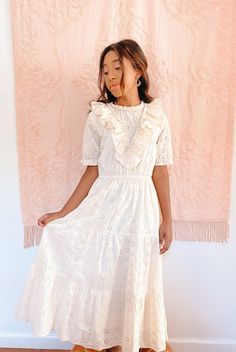 Feminine Tiered Scalloped Lace Dresses, Feminine Tiered Dress With Scalloped Lace, Summer Broderie Anglaise Tiered Dress, Summer Tiered Broderie Anglaise Dresses, Summer Broderie Anglaise Tiered Skirt Dresses, Summer Dresses With Broderie Anglaise And Tiered Skirt, Tiered Broderie Anglaise Day Dress, Tiered Broderie Anglaise Dress For Daywear, Feminine Tiered Lace Dress For Spring