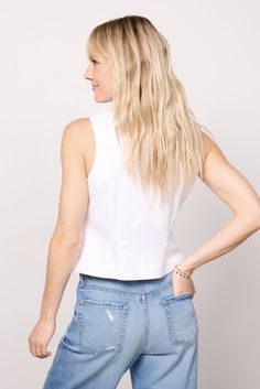 Round out your denim collection with this so-chic denim vest by EVEREVE. Finished in a bright white wash, this fitted silhouette features a front button closure and seam details for a tailored feel. Style with jeans or cargo pants for a day-to-night look. | EVEREVE Women's Sierra Denim Vest, Size Large, White White Denim Vest For Spring, White Fitted Denim Vest, Stretch Cotton Denim Vest For Summer, Spring Stretch Cotton Denim Vest, White Casual Vest For Spring, Summer Stretch Cotton Denim Vest, White Stretch Denim Tops, Trendy White Spring Vest, White Denim Vest For Summer