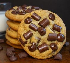 chocolate chip cookies are stacked on top of each other