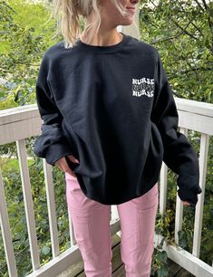 I am always looking for ways to spice up my scrubs at work! you can too with this cute and trendy nursing  crewneck!! (look better, work better right?! 😉) MATERIAL: All sweatshirts are unisex adult Gilden heavy blend 50% cotton and 50% polyester. See sizing chart prior to purchase for exact measurements!! very soft and cozy high quality material!!  CARE: turn crewneck inside out and machine wash with cold water. dry on low heat or air dry. do not apply iron directly to design and do not bleach. Nursing Outfits Scrubs, Nursing Crewneck, Nursing Sweatshirt, Nurse Outfit, Nurse Crewneck, Scrubs Outfit, Sweatshirt Trendy, Nurse Sweatshirt