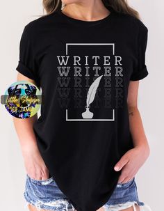 Looking for the perfect t-shirt to show your love for writing? Look no further than our "writer" t-shirt! This stylish and comfortable t-shirt is the perfect way to express your passion for writing while looking great. Made from 100% airlume combed and ringspun cotton, our writer t-shirt is designed to be soft, comfortable and durable. Whether you're working on your latest WIP or just hanging out with friends, this t-shirt is sure to be your go-to choice. Featuring bold, eye-catching lettering, Literary Black Cotton T-shirt, Black Literary Crew Neck T-shirt, Black Literary T-shirt With Letter Print, Writer Shirts, Author Gifts, Writer Gifts, Gifts For Bookworms, Book Lovers Gifts, Book Lover