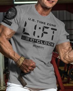 Lift O'Clock Funny Motivational Workout T-Shirt, Lifting Shirt, Gym Gear, Gym Apparel, Workout Gift, Gift for him, Gift for Weightlifters The Lift O'Clock T-Shirt is perfect for motivating you during your workouts. It is made with a very soft and lightweight fabric blend of 60% cotton and 40% polyester, providing a comfortable and regular fit. The manly fashion cut with side seams adds a touch of style to your workout wardrobe. Bodybuilding T Shirts, Funny Gym Shirts, Gym Gear, Fitness Gifts, Gym Humor, Workout Humor, Gym Shirts, Workout Tshirts, Gym Outfit