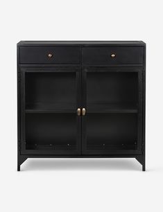 a black cabinet with two doors and three shelves on one side, in front of a white background