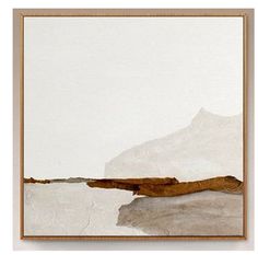 an abstract painting with white and brown colors in a frame on the wall above it