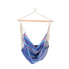 a blue and red striped hammock hanging from a wooden hanger on a white background