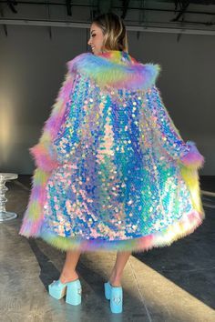 Glamorous Winter Outerwear With Contrast Sequin, Party Multicolor Sequined Outerwear, Multicolor Sequined Party Outerwear, Party Fur Coat With Faux Fur Trim, Iridescent Outerwear For Fall Party, Spring Party Fur Coat With Faux Fur Trim, Glamorous Long Sleeve Fur Coat For Party, Space Island, Sequin Coats