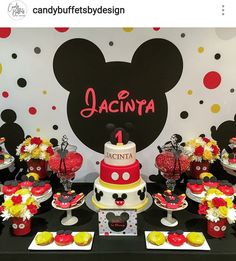 a mickey mouse themed birthday party with cake and desserts