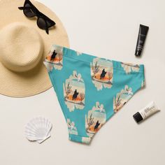 Western cowboy printed, high-waist bikini bottoms. These turquoise bikini bottoms are perfect for a day at the beach or by the pool. With a comfortable fit and western cowboy print, these swimsuit bottom will make you look and feel your best. • Fabric composition in the EU: 88% recycled polyester, 12% elastane • Fabric weight in the EU (may vary by 5%): 6.78 oz/yd² (230 g/m²) • Fabric composition in MX: 81% REPREVE recycled polyester, 19% LYCRA XTRALIFE • Fabric weight in MX (may vary by 5%): 7. Printed Bottoms For Sunbathing In Summer, Turquoise Bottoms For Summer Beach Party, Turquoise Beachwear Bottoms For Beach Season, Turquoise Bottoms For Summer Pool, Turquoise Bottoms For Beach Vacation, Turquoise Bottoms For Beach Season Vacation, Turquoise Summer Bottoms For Pool, Turquoise Bottoms For Pool And Summer, Turquoise Summer Bottoms For Beach Season