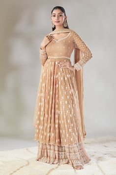 Beige anarkali with white floral embroidered buttis. Comes with coordinating embroidered sharara and bordered dupatta. - Aza Fashions Anarkali Palazzo Set For Reception, Anarkali Style Maxi Length Palazzo Set For Reception, Beige Georgette Anarkali Set For Reception, Bollywood Style Beige Dress With Zari Work, Fitted Beige Anarkali Sharara, Beige Bollywood Saree Dress, Beige Fitted Anarkali Sharara, Wedding Anarkali Palazzo Set With Resham Embroidery, Anarkali Style Cream Georgette Palazzo Set