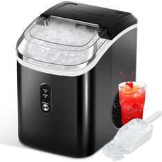 a black and silver ice maker next to a red drink