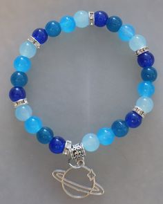 Handmade Bracelet in the colours of Neptune. Glass Bead Ideas, Glass Bead Bracelet Patterns Ideas, Bracelet Ideas Words, Glass Beaded Bracelets Ideas, Glass Beads Bracelet Ideas, Glass Bead Bracelet Ideas, Body Jewelry Diy, Universe Planets, Girly Bracelets