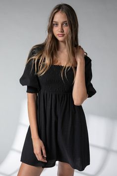 Specifications: 55% Cotton 45% Viscose Smocked Square Neck Tassel Tie Back Mini length Pockets Unlined Black Smocked Dress, Black Smock Dress, Black Puff Sleeve Dress, Smocking Dress, Smocked Mini Dress, Cotton Poplin Fabric, Boho Summer Dresses, Tee Shirt Dress, Prairie Dress