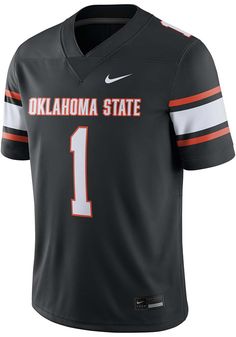 Get a piece of the OSU Cowboys action with this Oklahoma State Cowboys Black Alternate Football Jersey. You'll look like one of the team as you wear this Jersey to support your Cowboys. With a player number on front, this Football Jersey makes a great addition to any Cowboys fan's closet. Dri-FIT moisture-wicking technology, Standard fit for relaxed feel, Striped design on sleeves, Screen printed number one on front and back, Unisex, 100% POLYESTER Black Tops With Number Print For Football Season, Black Sports T-shirt With Number Print, Collegiate Jersey Tops For Gym, Collegiate Sports Tops With Number Print, Collegiate Black Breathable Tops, Collegiate Style Breathable Black Tops, Black Varsity Tops With Moisture-wicking, Black Moisture-wicking Varsity Top, Cowboy History