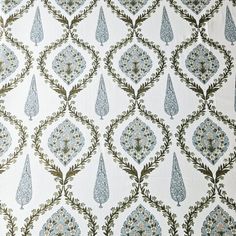 an upholstered wallpaper with blue and green designs