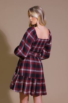 A woven plaid mini dress featuring sweetheart neckline, smocked bodice, long sleeve, self sash tie and ruffled hemline Details: Self : 50% Polyester 50% Cotton Size & Fit - Model is 5`8" And Wearing Size Small- Measurements Taken From Size Small- Approx. Length: 34" Plaid Mini Dress, Girls Outerwear, Blouse Jeans, Flying Tomato, Skirt Jumpsuit, Boys Pajamas, Romper With Skirt, Swimsuit Cover, Girls Sweaters