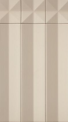 a beige wall that has some lines on it