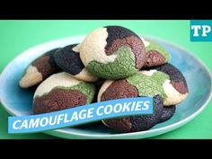 some cookies that are sitting on a plate with the words camouflage cookies in front of them