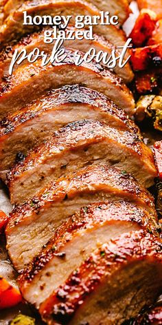 sliced pork loin sitting on top of a white plate